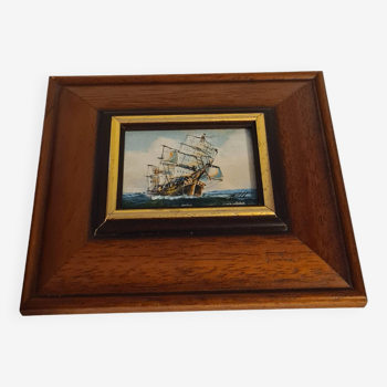 Wooden frame with boat decor