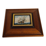 Wooden frame with boat decor