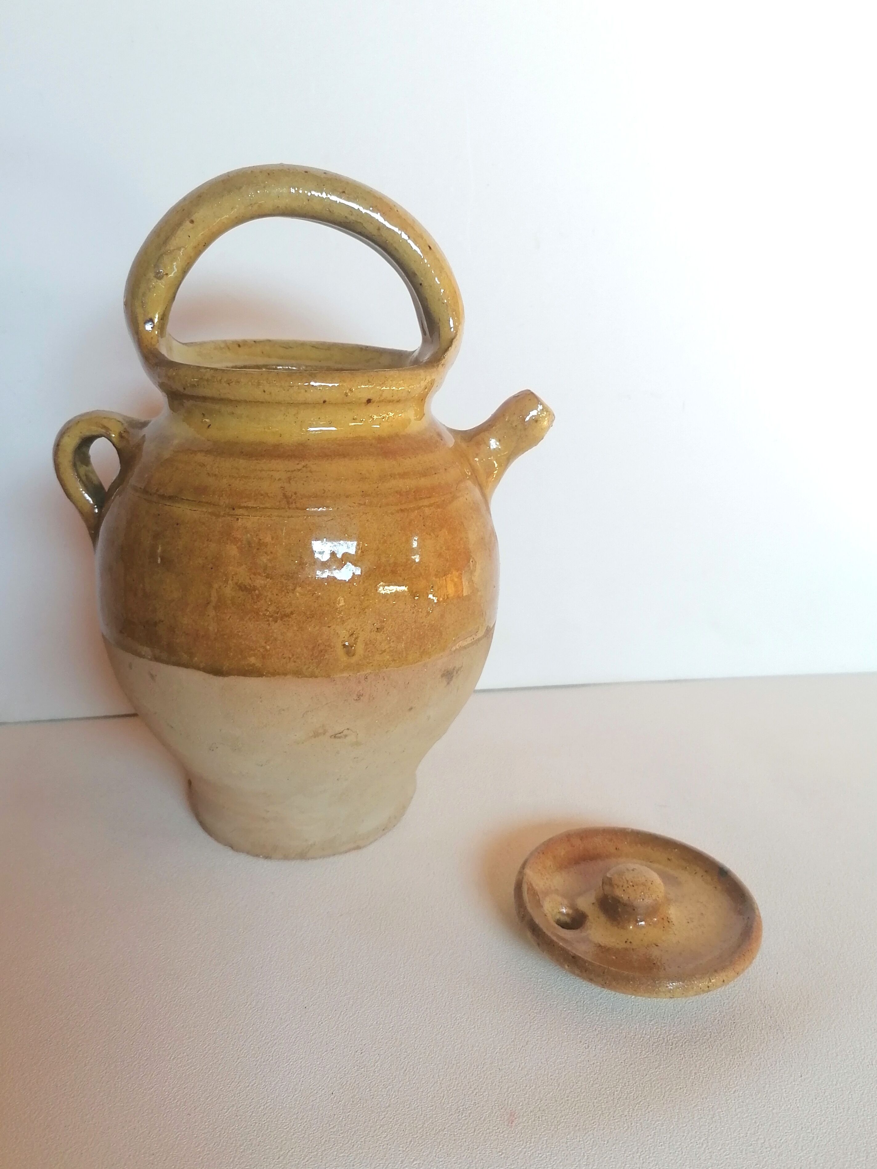 Enamelled jug with lid