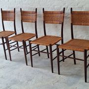 Four teak dining chairs with patinated cane after Gio Ponti, Italy 1960s