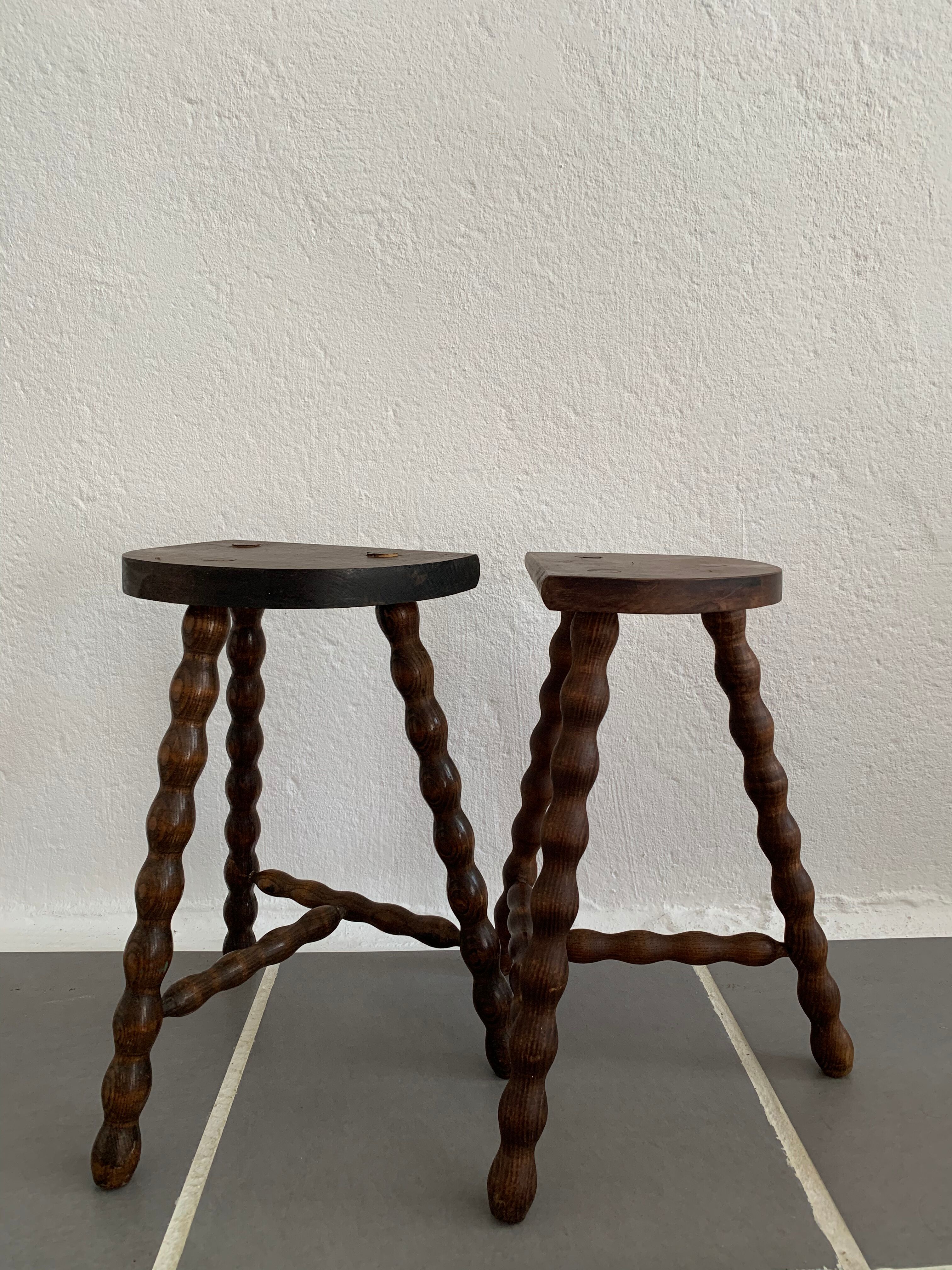 Pair of tripod stools turned wood