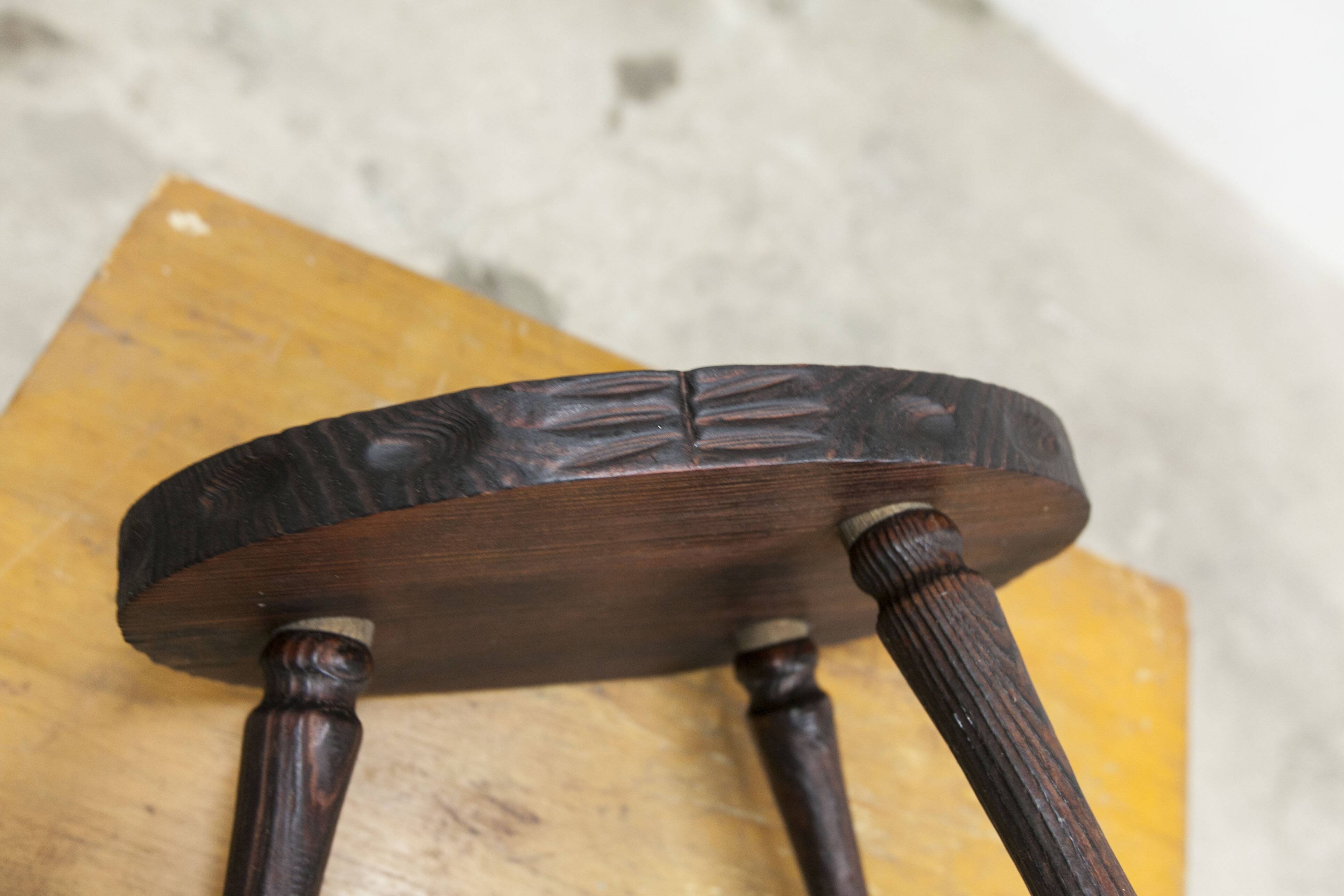 Low brutalist solid wood stool 1950