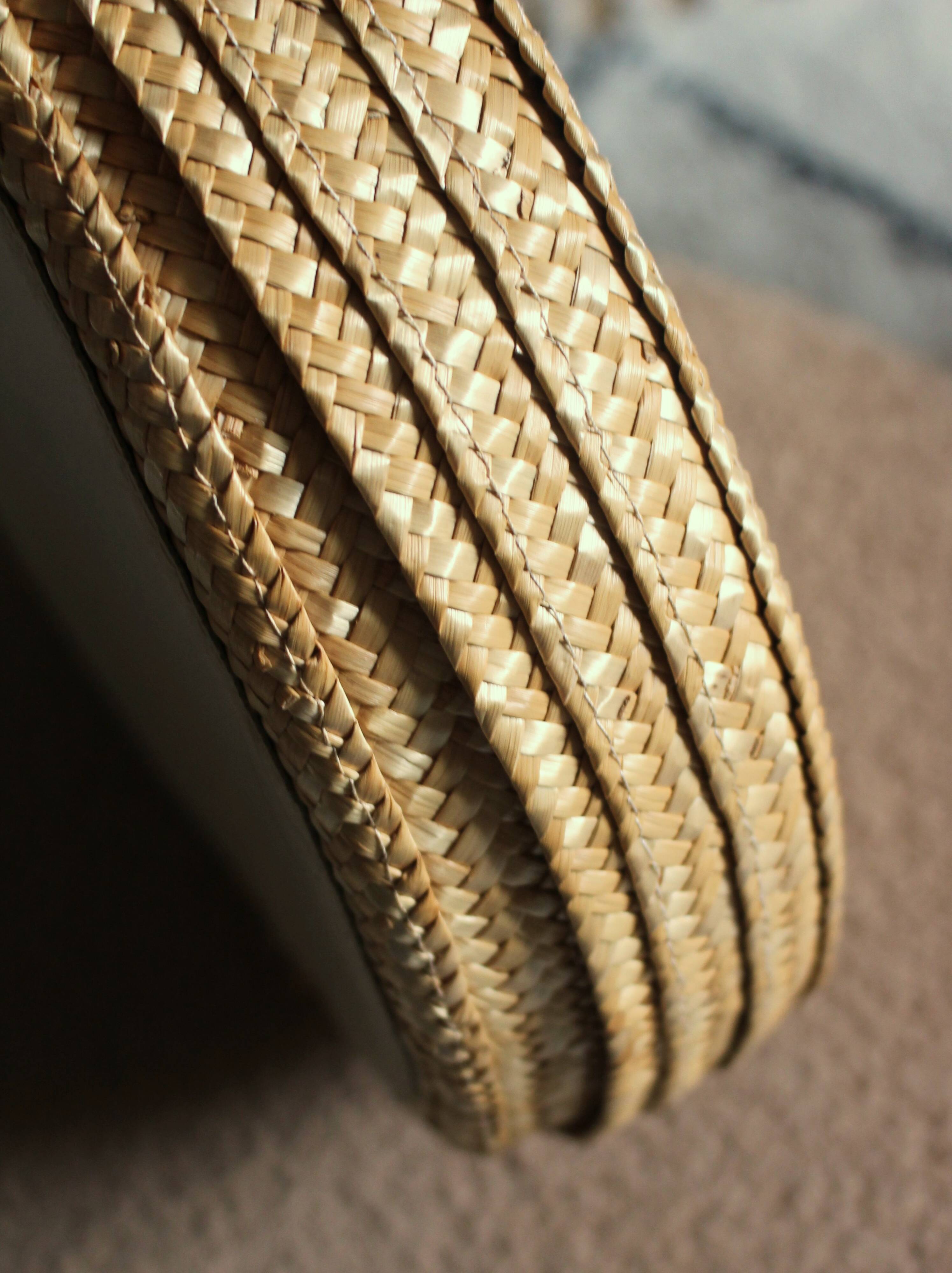 Round wicker basket with lid, vintage soft weaving.