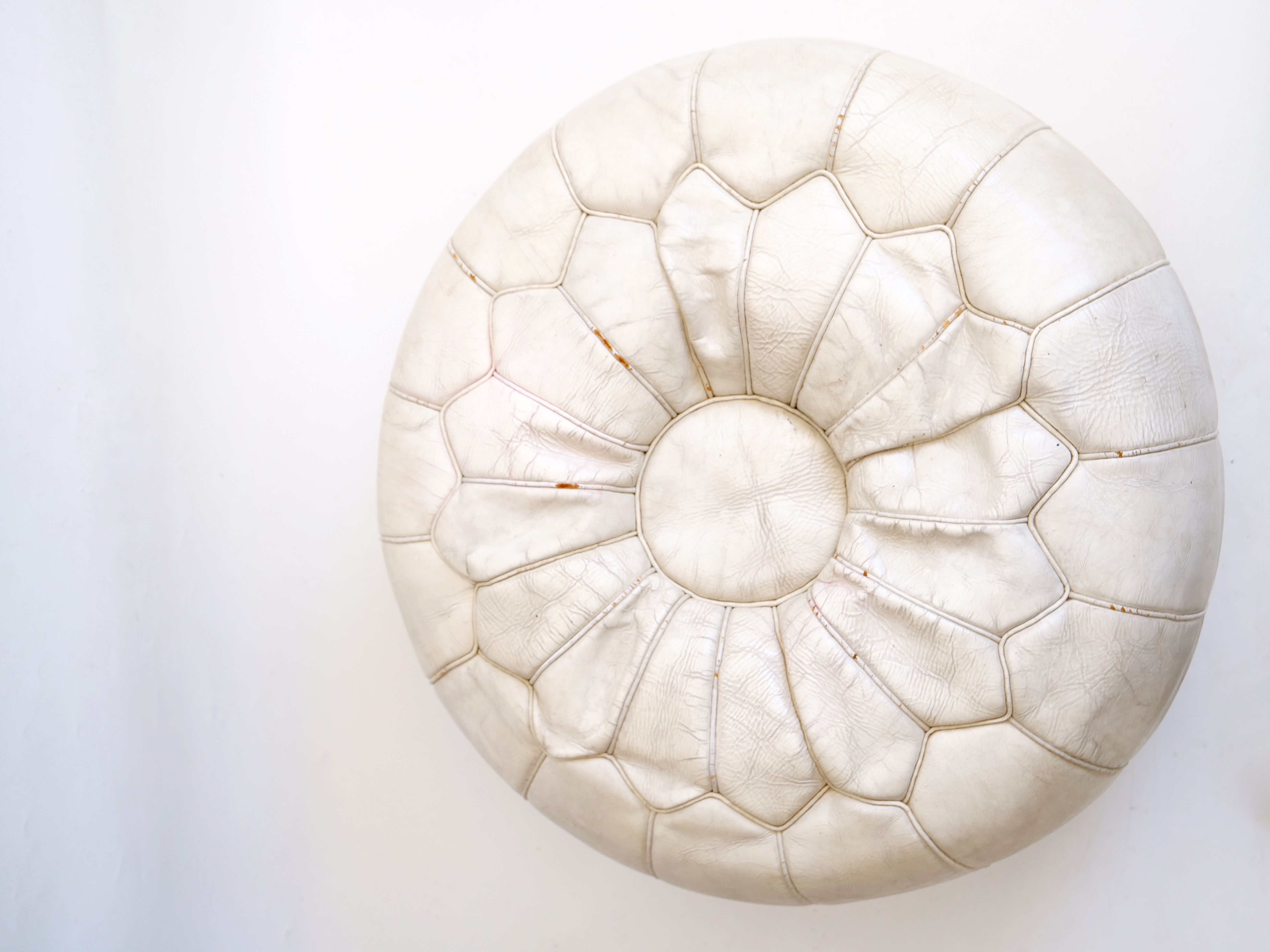 Off-white leather patchwork pouf