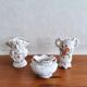 3 bouquetières in porcelain and biscuit
