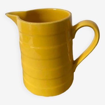 Old yellow porcelain pitcher stamped Saint Clément