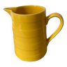 Old yellow porcelain pitcher stamped Saint Clément