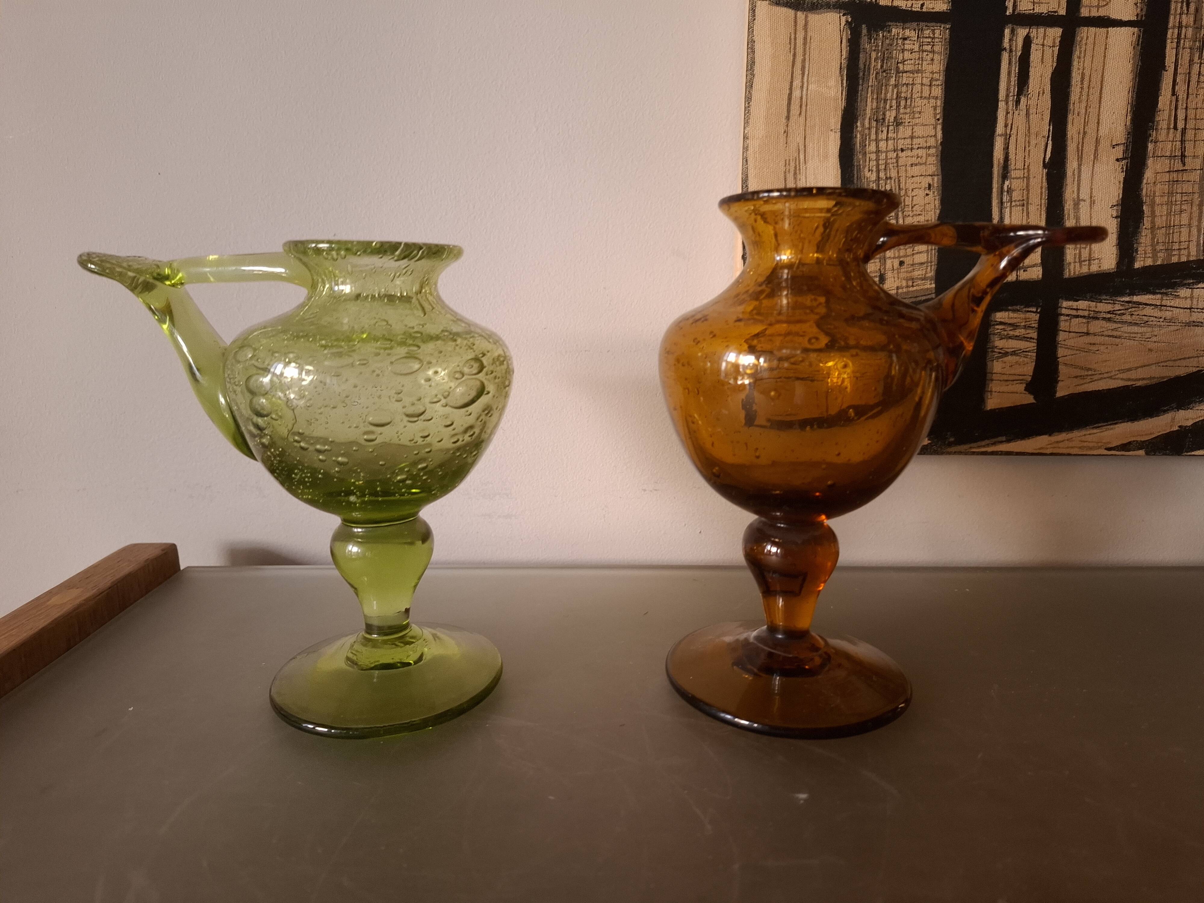 Two biot blown glass candle holders