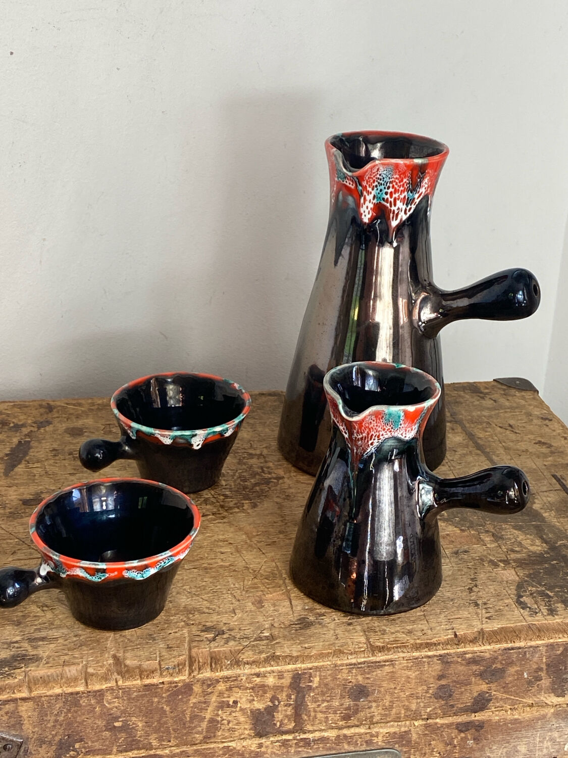 Pitchers and cups, iridescent ceramic, Vallauris