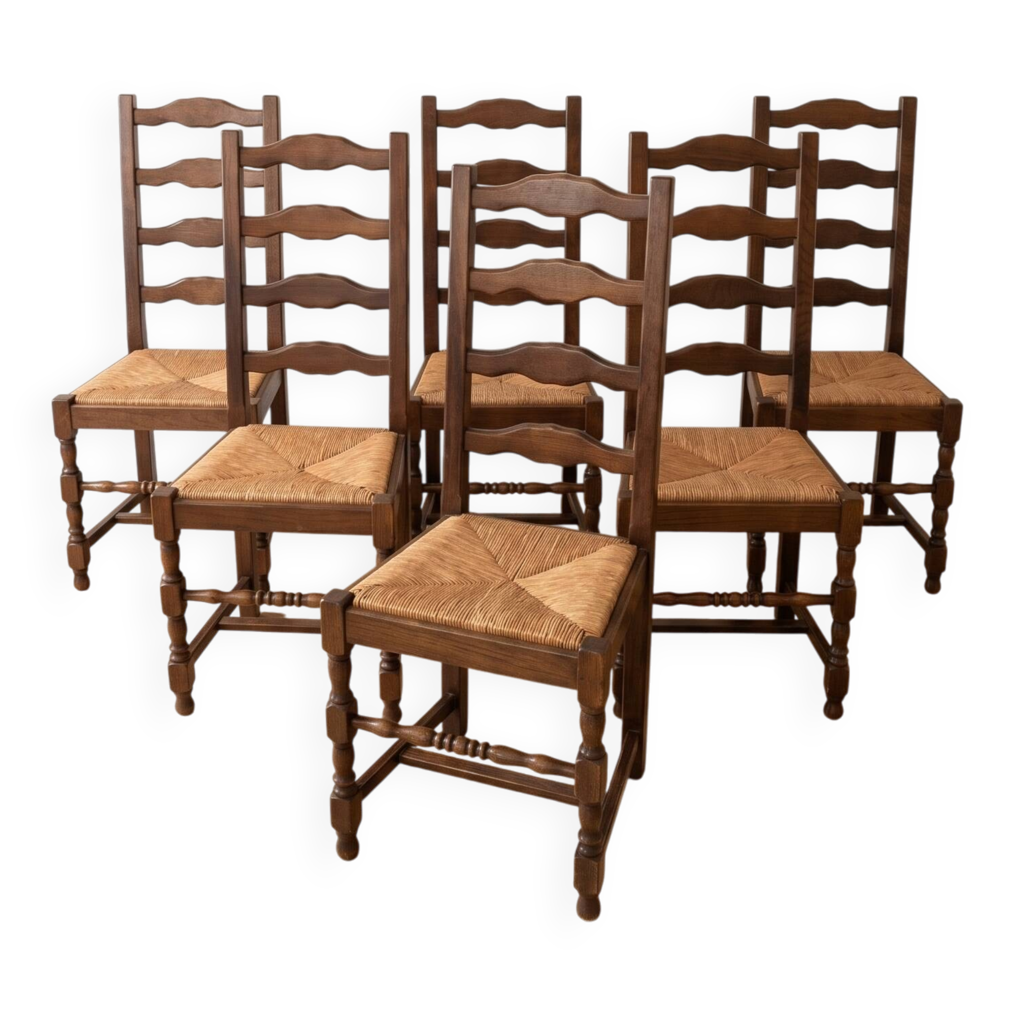 Set of 6 rustic wooden chairs with woven straw.