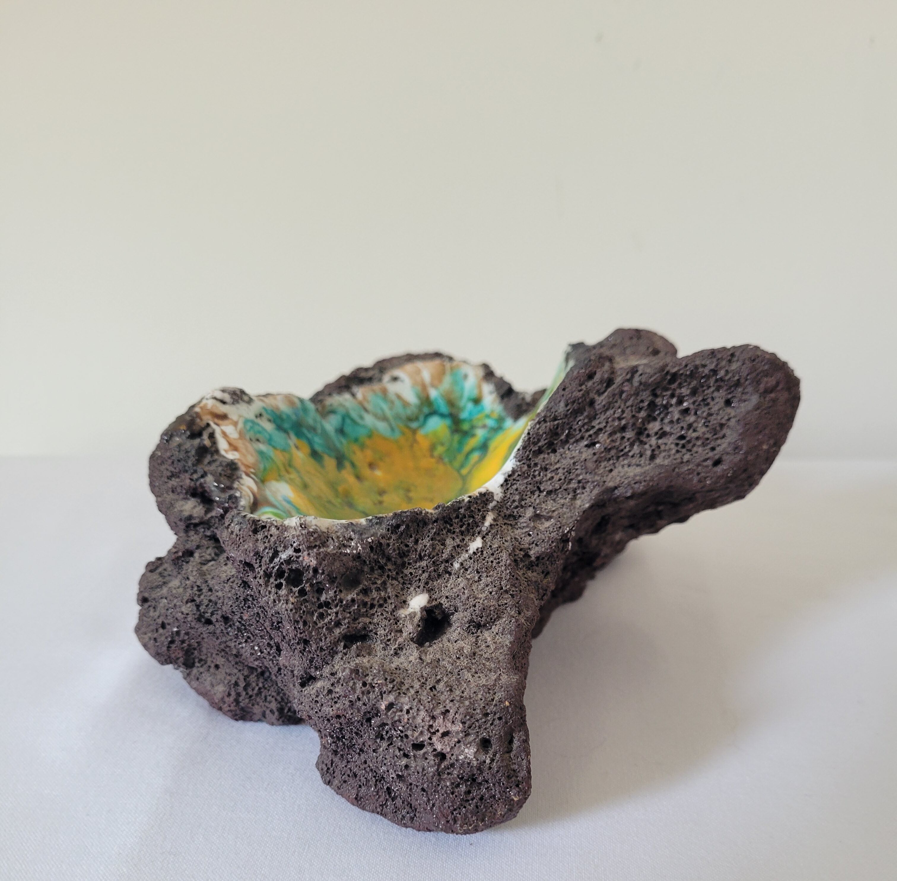 Enamelled lava stone ashtray