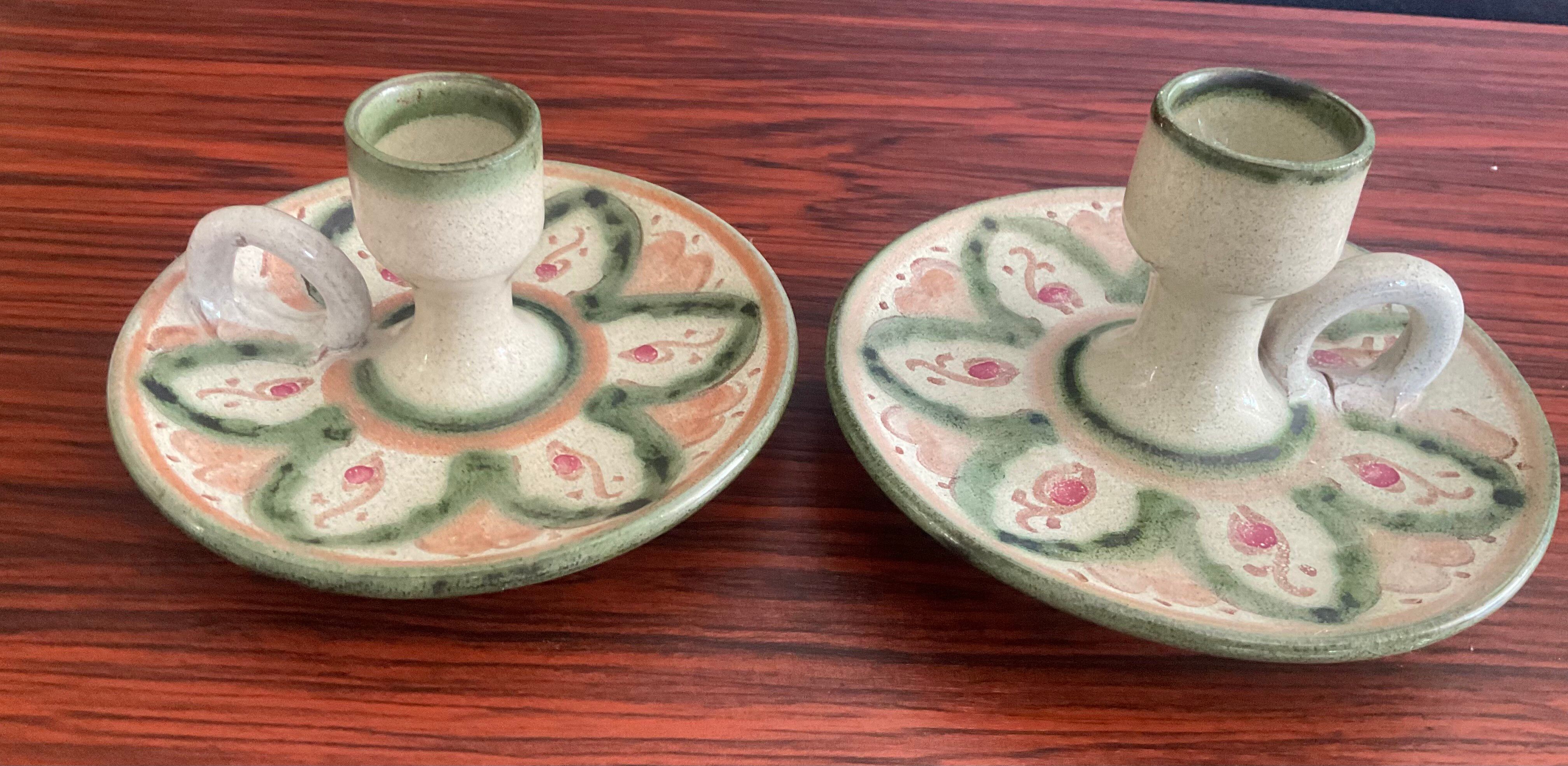Pair of vintage cave rat candlesticks in glazed terracotta