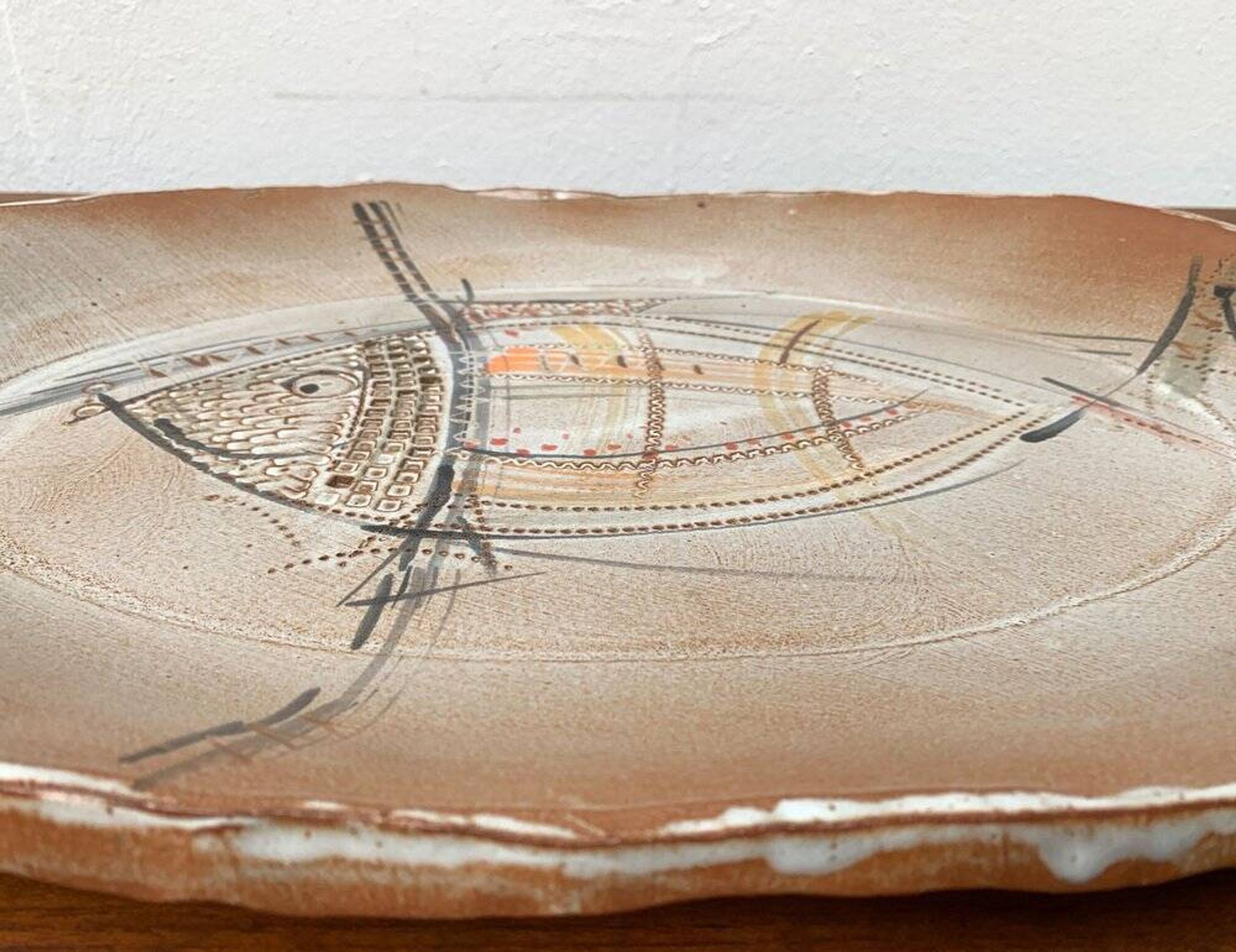 Large German ceramic plate with fish from the mid-century.