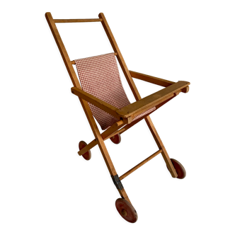 Folding wooden stroller