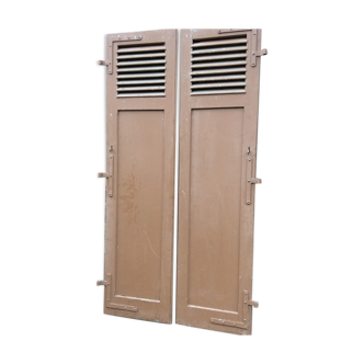 Pair of ancient shutters with wrought iron fittings