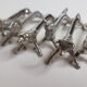 Six old animal knife holders in chrome metal