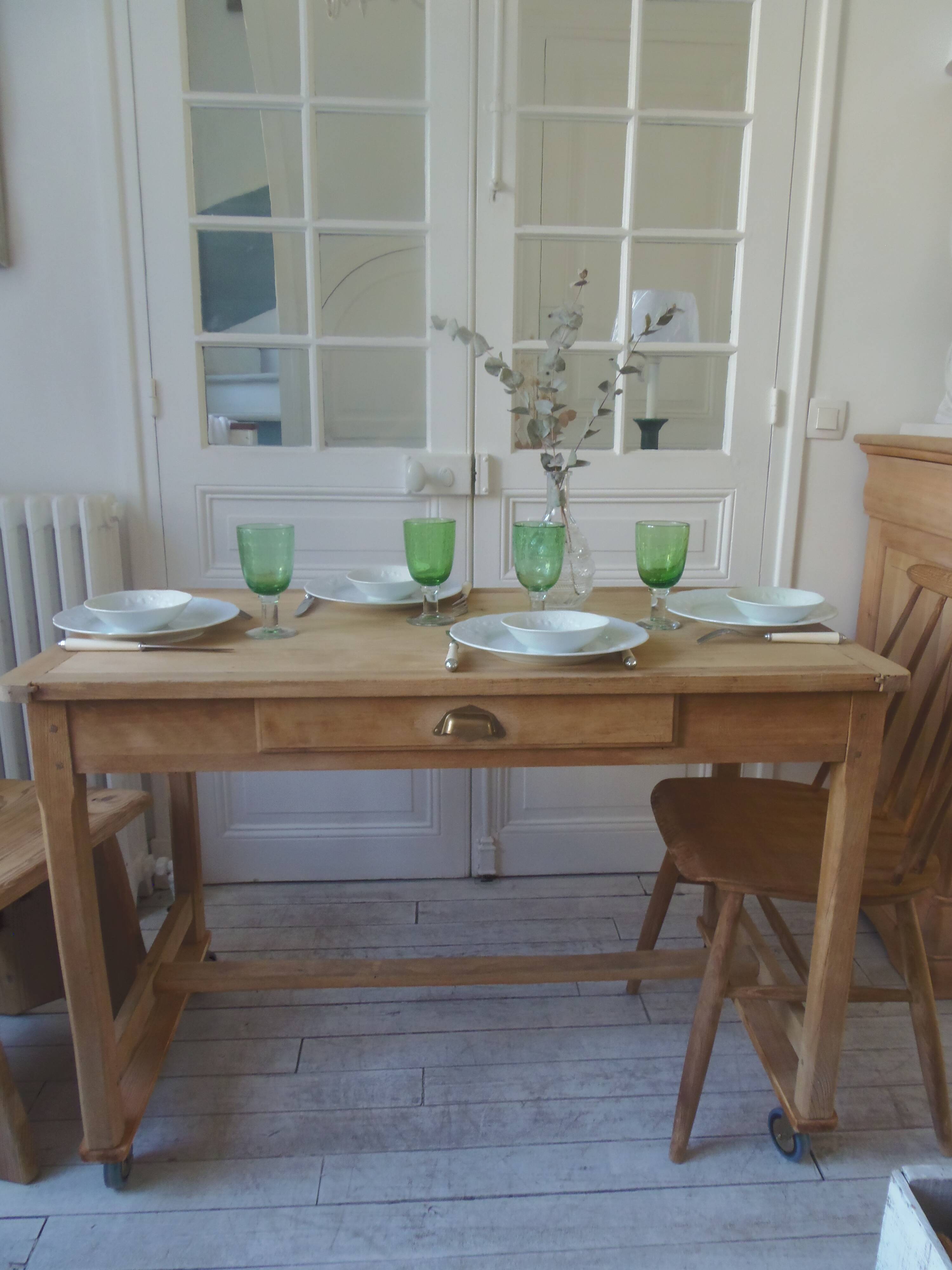 Vintage kitchen table on casters.