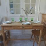 Vintage kitchen table on casters.