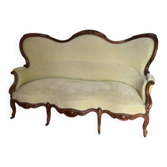 Restored Louis XV canapé, period woodwork, newly refurbished upholstery.