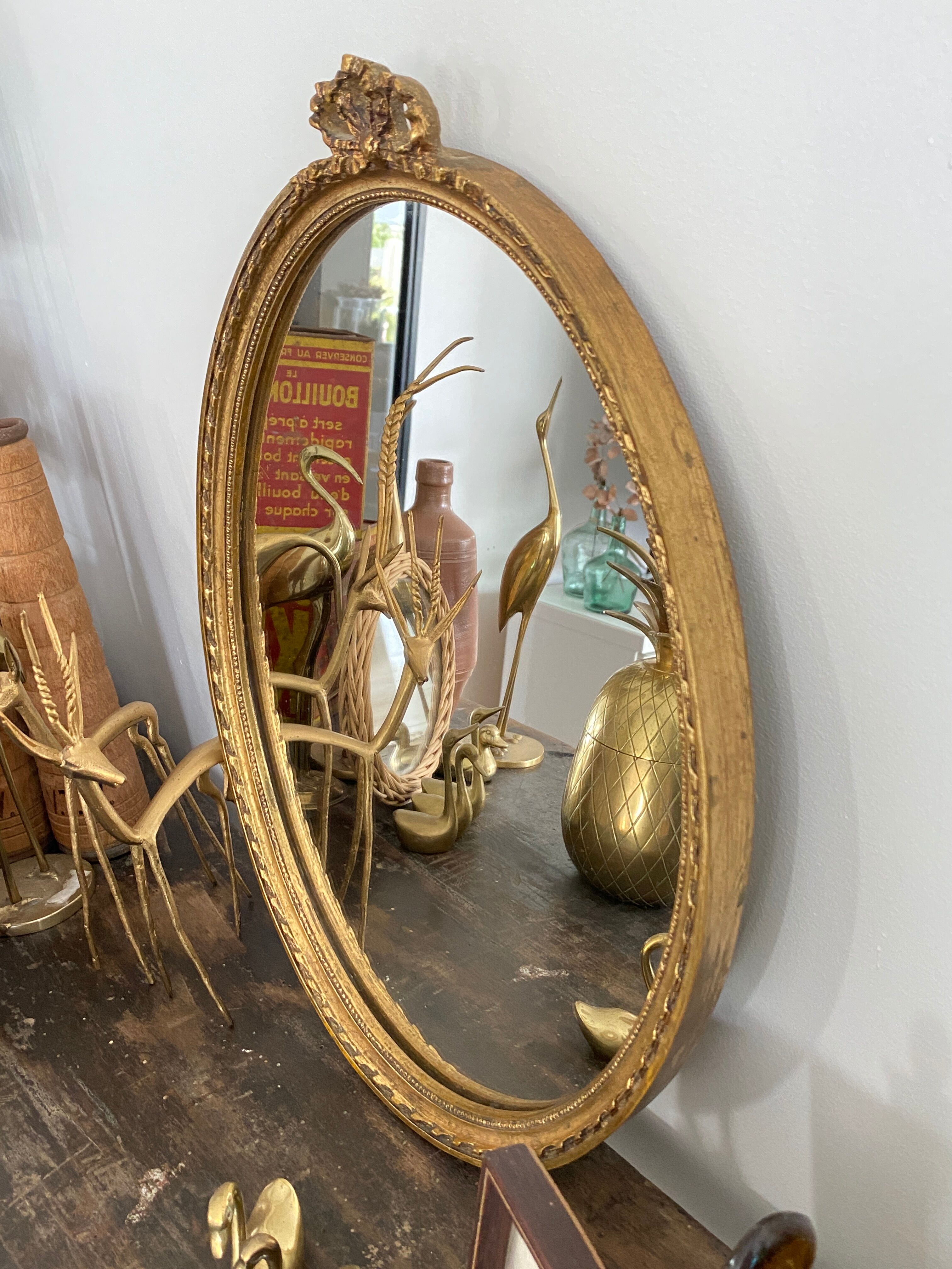 Golden oval mirror 32x44cm