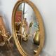 Golden oval mirror 32x44cm