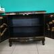 Buffet of black and gold laqué Chinese storage with relief subjects decorated flowers painted birds