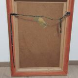 Mirror in gilded stucco wood and beveled glass