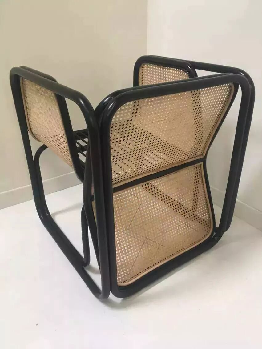 Armchair in black lacquered rattan and natural cane