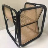 Armchair in black lacquered rattan and natural cane