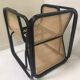 Fauteuil en rotin laqué noir et cannage naturel