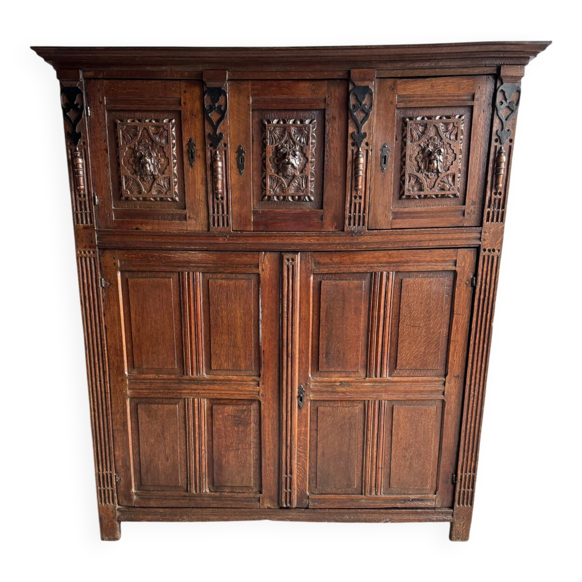 Antique Dark Wood Carved Cabinet with Hand-Carved Floral Motifs and Metal Handles