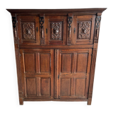 Antique Dark Wood Carved Cabinet with Hand-Carved Floral Motifs and Metal Handles