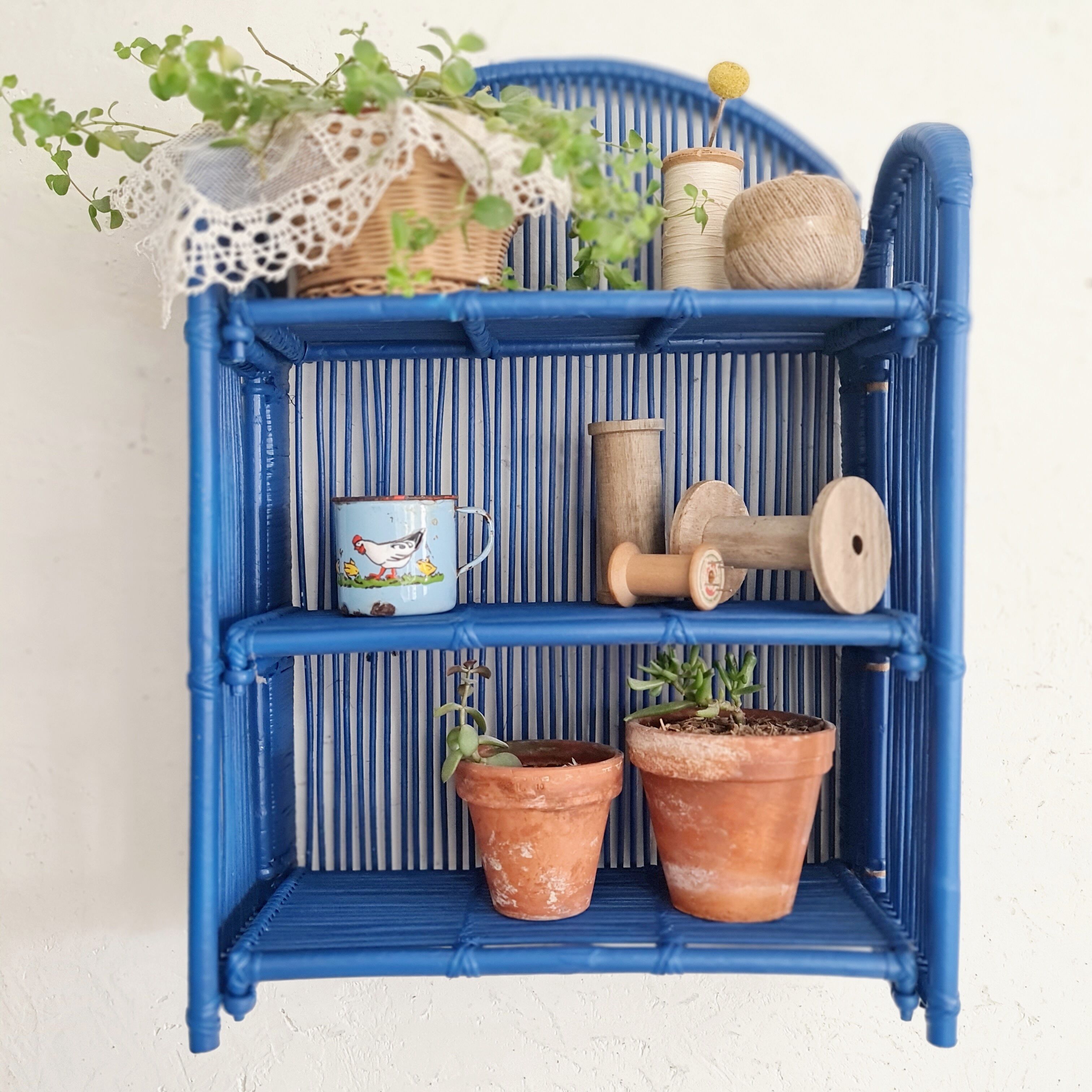 Vintage shelf in Klein blue rattan