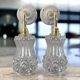 Pair of vintage gold and chiseled glass wall lights