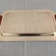 Plates and a brass and Bakelite cut by PM Italy, Italy around 1970.