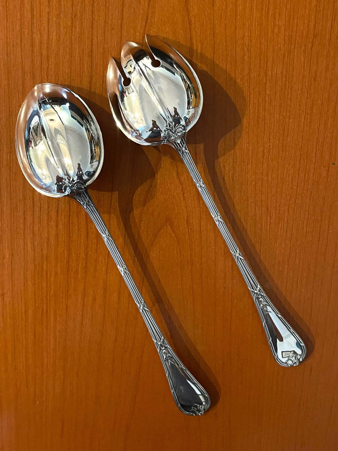 Christofle ribbon and bell-shaped salad serving pieces, very beautiful and