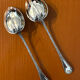 Christofle ribbon and bell-shaped salad serving pieces, very beautiful and