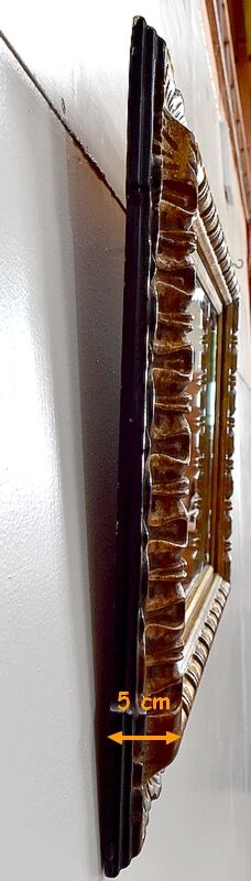 Gold-tinted wooden and stucco rectangular mirror - 1920