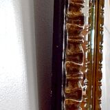 Gold-tinted wooden and stucco rectangular mirror - 1920