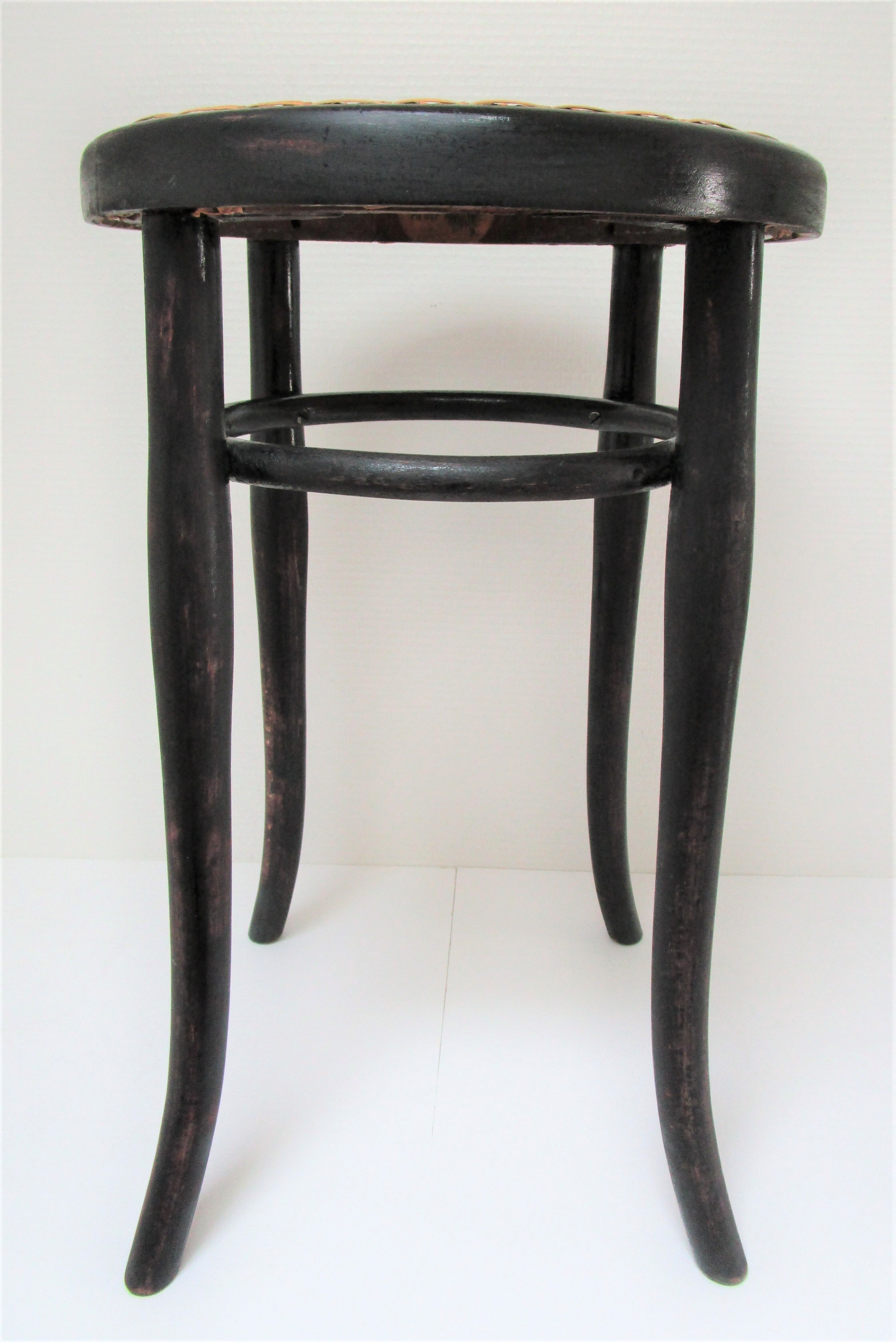 Black skated Thonet stool stamped