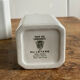 4 old white pharmacy style bottles