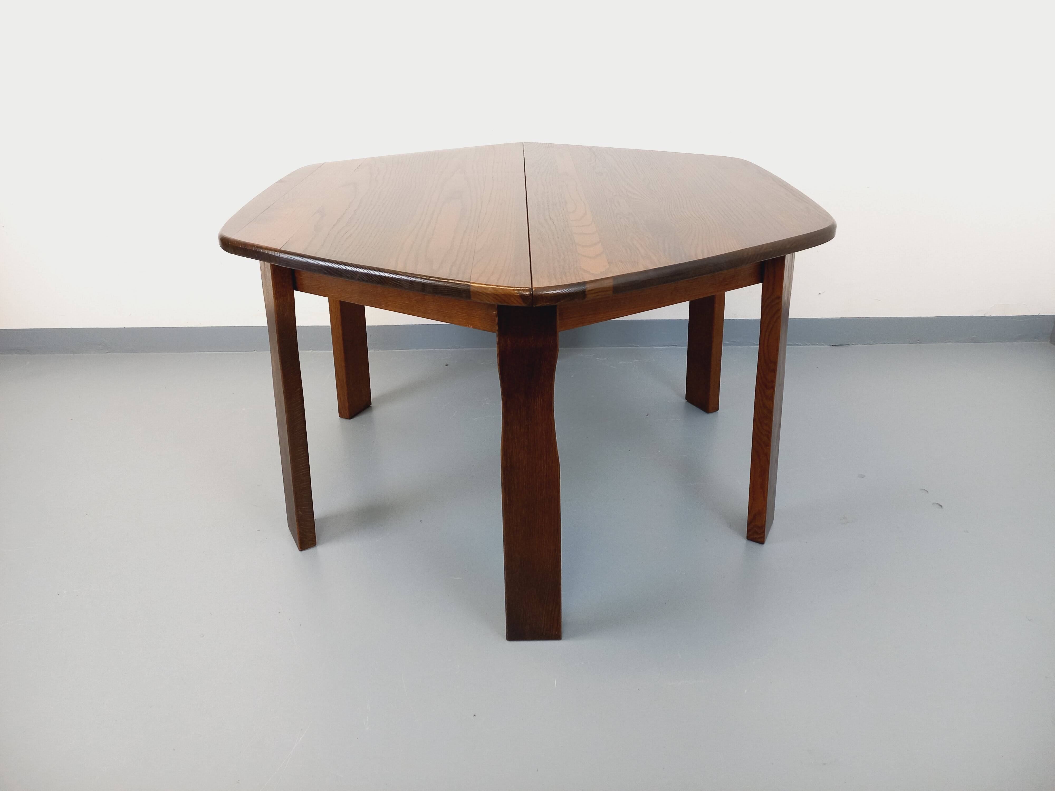Vintage brutalist hexagonal dining table made of oak from the 1950s.