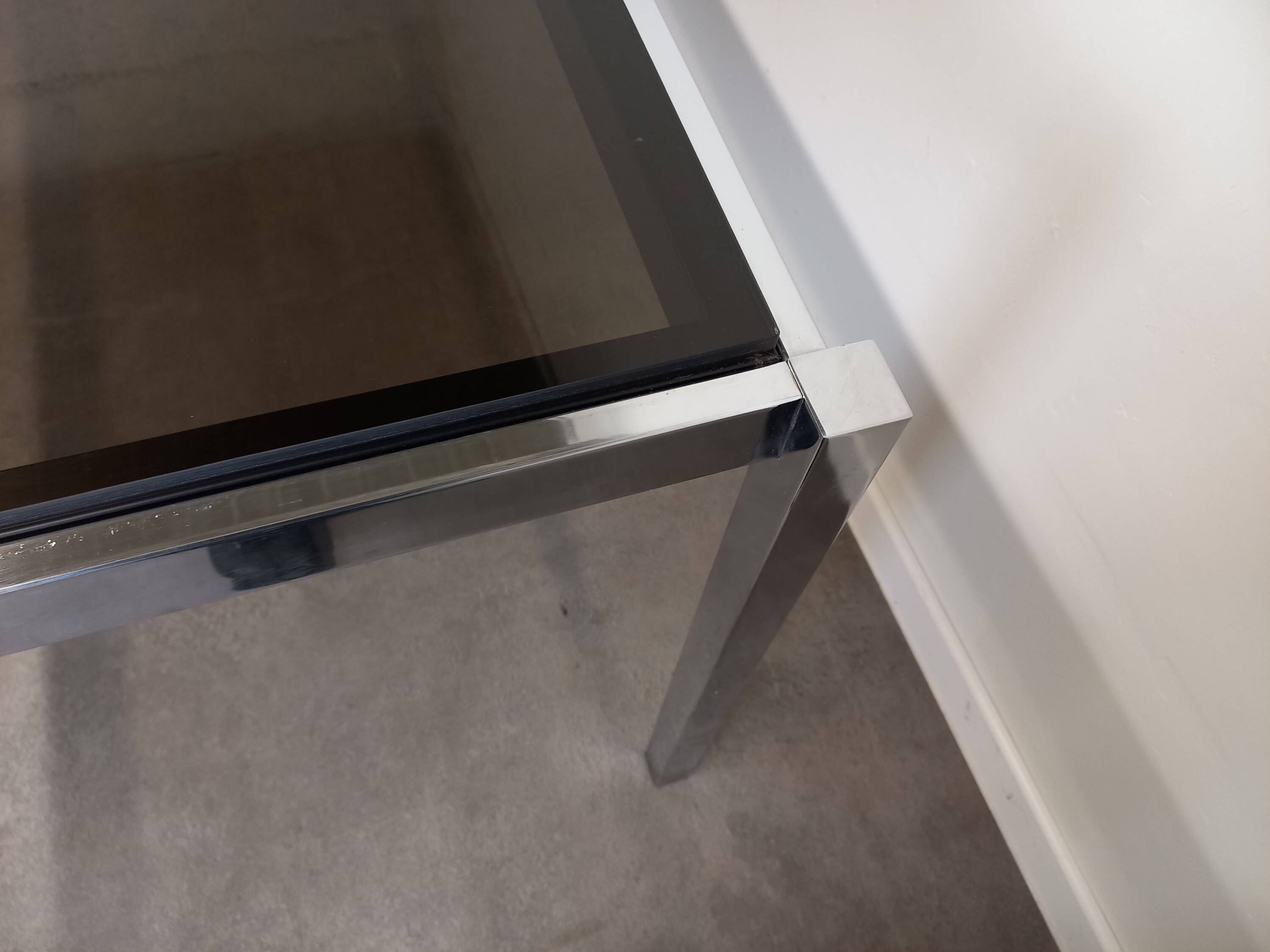 Table à manger verre et métal chromé 168 cm