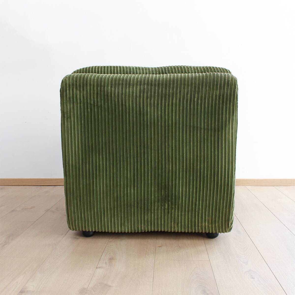 Modular vintage sofa with green cord upholstery