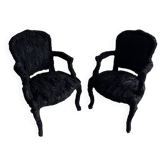 Set of 2 black fabric theatre armchairs with a feather effect.