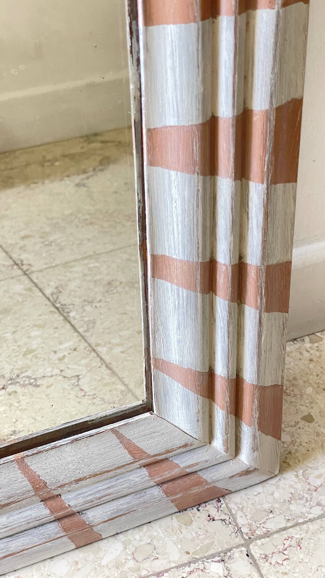 Old mirror in hand-painted wood