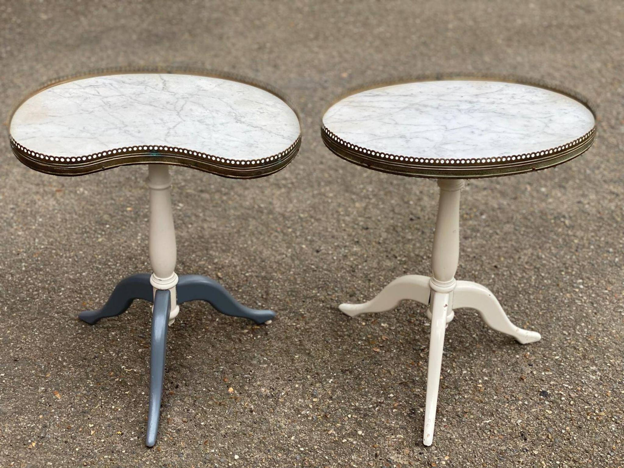 Pair of marble and ivory tripod pedestal tables