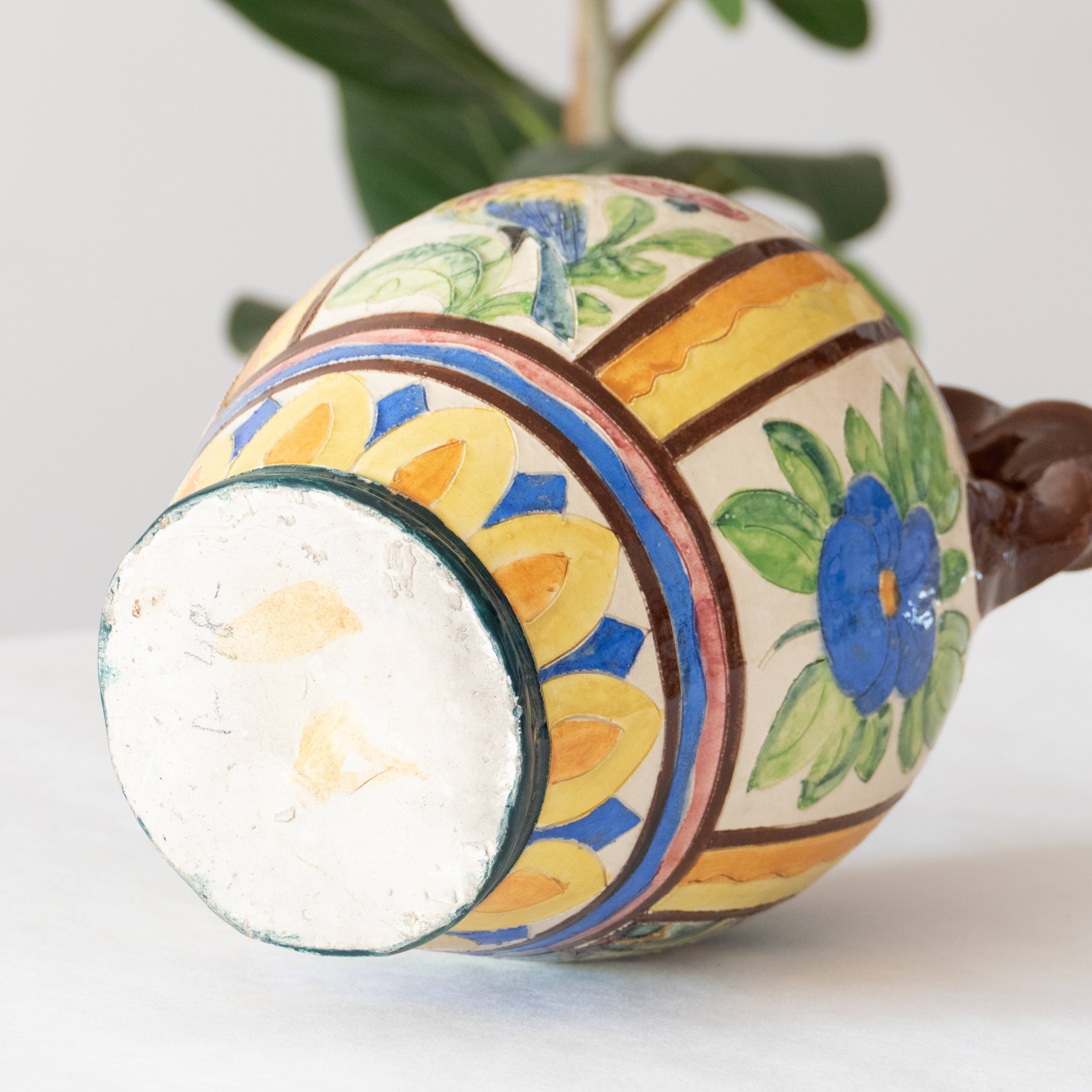 Old handcrafted amphora / polychrome bird glazed terracotta vase