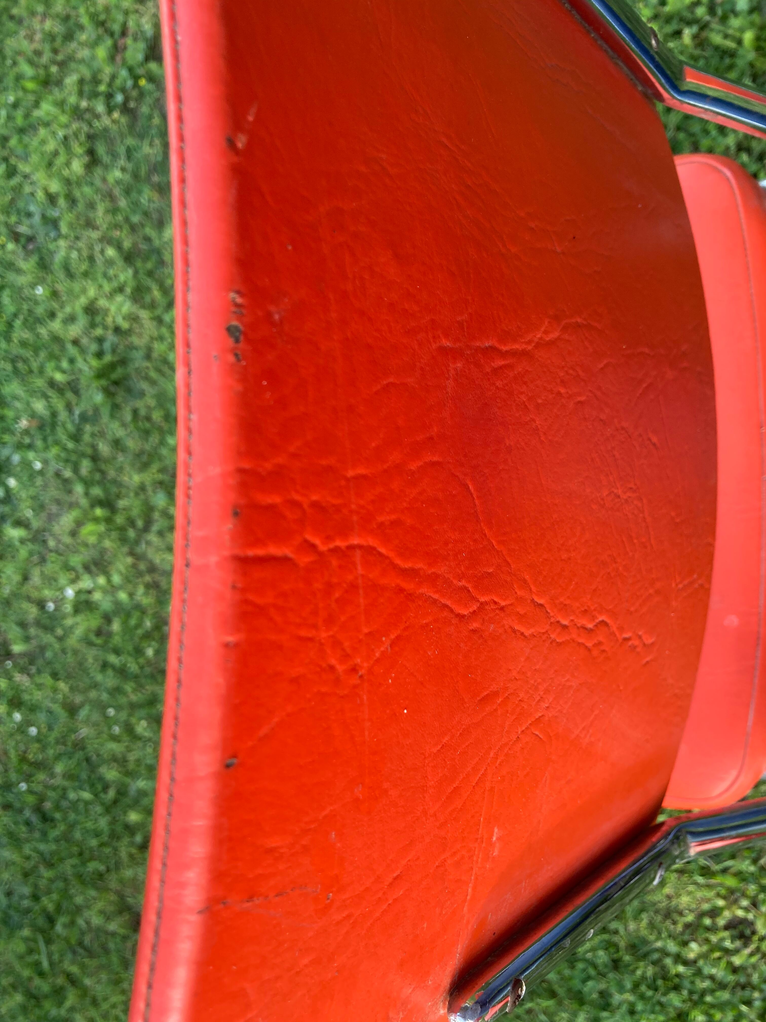 Series of 4 vintage orange chairs