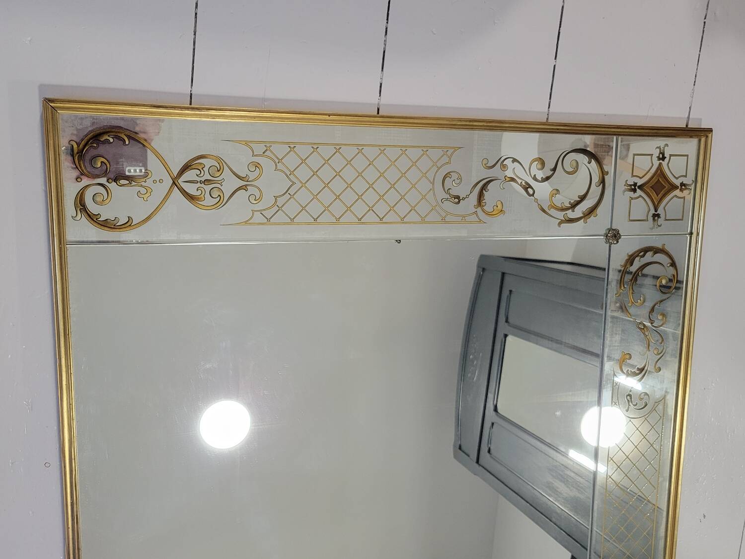 Eglomise brasserie mirror, late 19th century